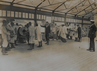 Boys of the Royal Navy training with guns at Shotley Barracks by English Photographer
